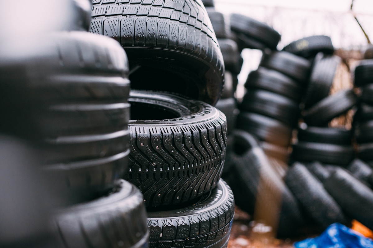 Tire being mounted on a rim with a touchless tire machine